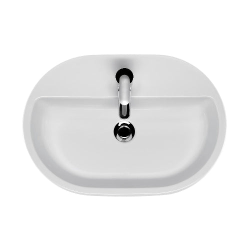 White oval sink with a silver faucet on a white background