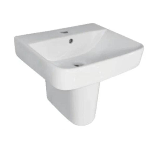 A white ceramic washbasin with a pedestal base.