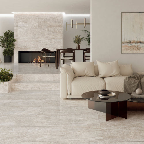 Modern living room with a fireplace, sofa, and coffee table.