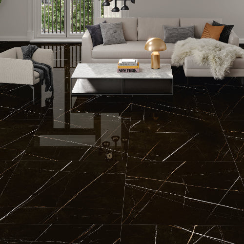 Modern living room with black marble tiles and a gray sofa.