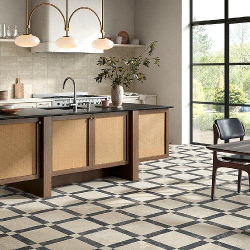 Modern kitchen with wooden cabinets, black countertop, and decorative elements.