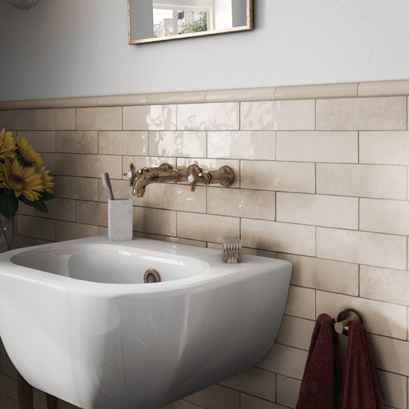 Artisan Ochre Zellige effect tiles on bathroom wall