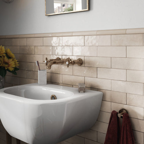 Artisan Ochre Zellige effect tiles on bathroom wall