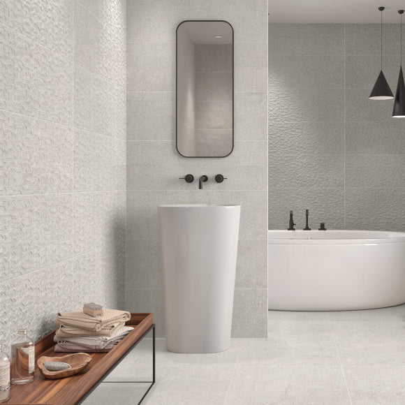 Grey tiles on bathroom wall and floor