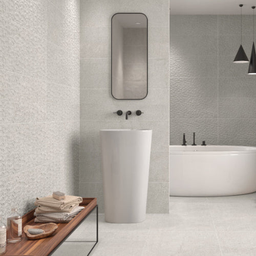 Grey tiles on bathroom wall and floor