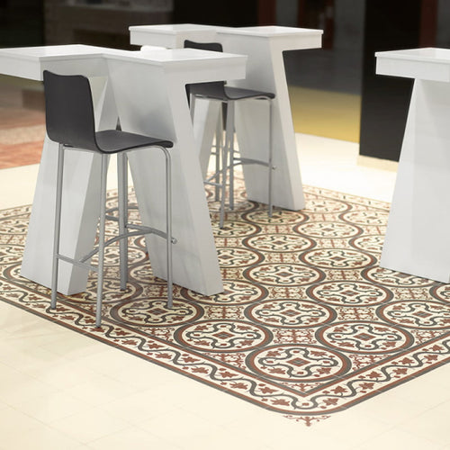 Lifestyle image of Victorian Nou pattern tiles used on the floor of a dining room