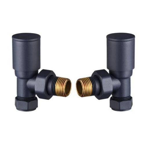 Two angled radiator valves with black bodies and gold-colored threaded connectors.