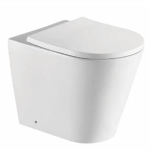 A white rimless back-to-wall toilet with a contemporary design, visible without a cistern.
