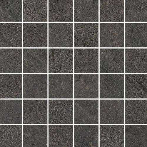 A grid of white porcelain tiles with varying shades of grey and beige, reflecting a natural stone pattern.
