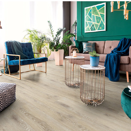 Modern living room with wooden flooring, furniture, and decorative elements.