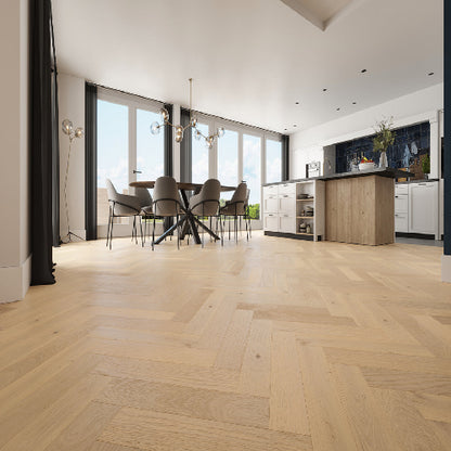 Modern kitchen with wooden flooring and a dining area.