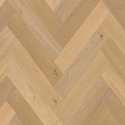 Wooden floor with herringbone pattern in beige and brown tones