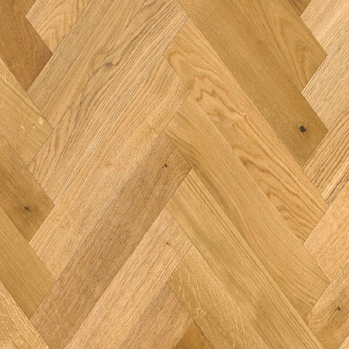 Close-up of wooden flooring with a herringbone pattern