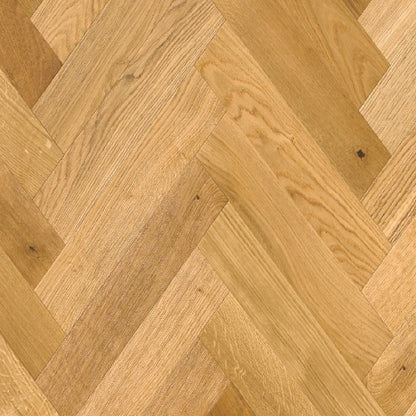 Close-up of wooden flooring with a herringbone pattern