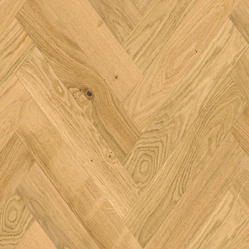 Close-up of wooden flooring with a herringbone pattern