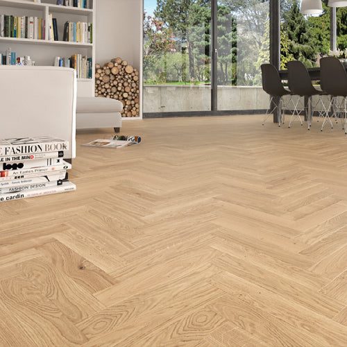 Wooden floor with a modern interior setting including books and furniture.