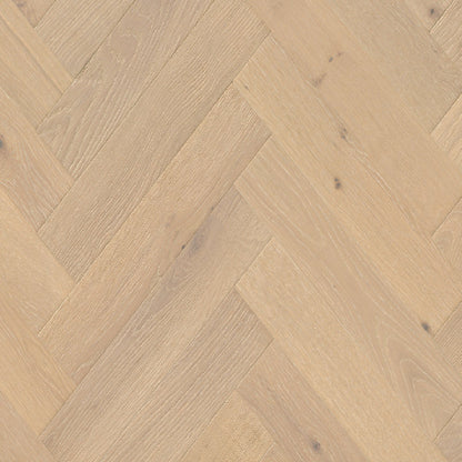 Close-up of wooden flooring with a herringbone pattern