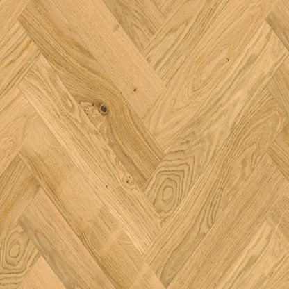 Close-up of wooden flooring with a herringbone pattern