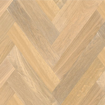 Wooden floor with herringbone pattern in beige and brown tones