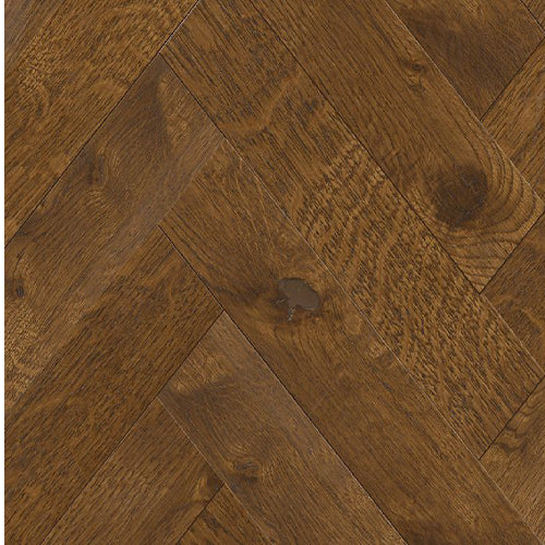 Close-up of wooden flooring with a herringbone pattern