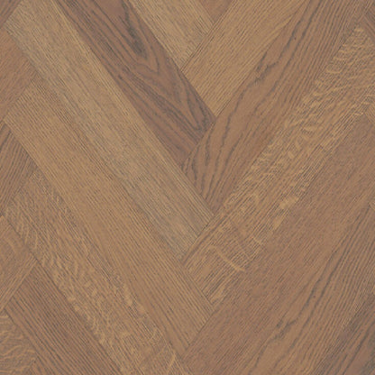 Close-up of wooden flooring with a herringbone pattern