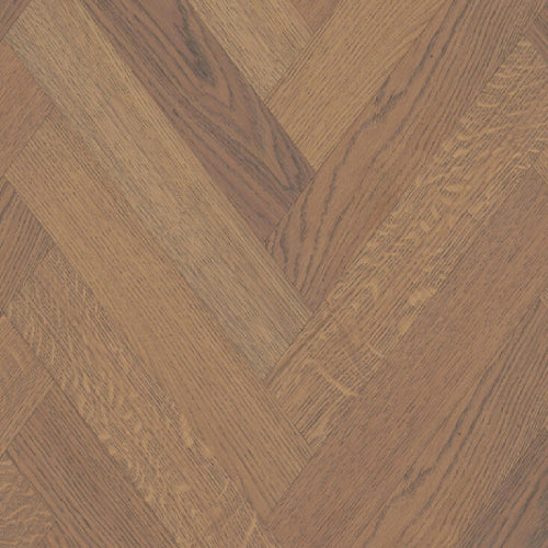 Close-up of wooden flooring with a herringbone pattern