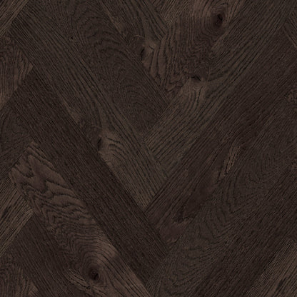 Close-up of dark wood flooring with a herringbone pattern