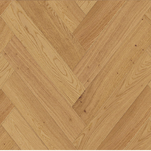Close-up of wooden flooring with a herringbone pattern