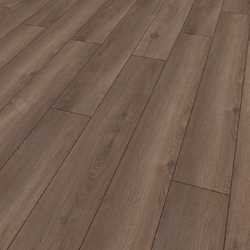 Close-up of wooden flooring with a herringbone pattern