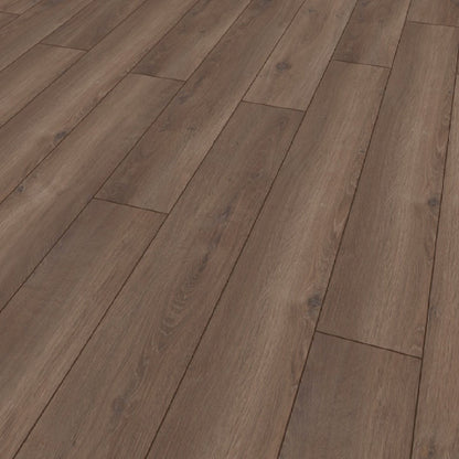 Close-up of wooden flooring with a herringbone pattern