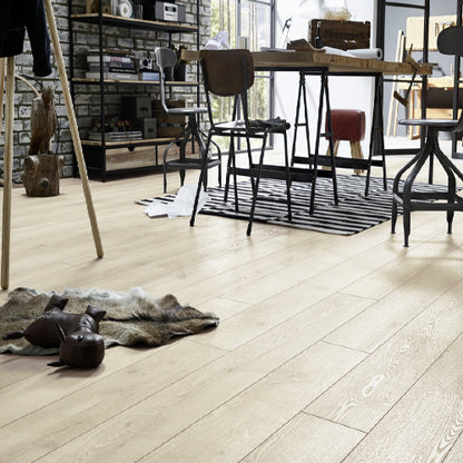 Wooden flooring in a modern interior setting with chairs and decor.