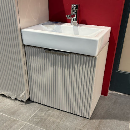 White sink with silver faucet 