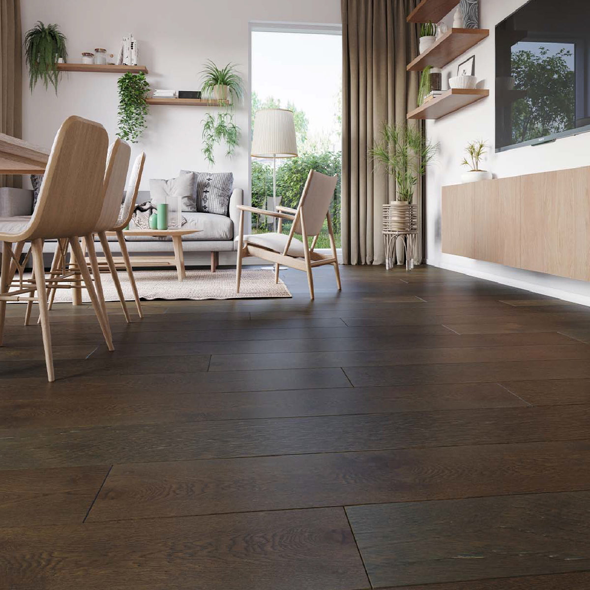 Modern living room with wooden flooring, furniture, and plants.
