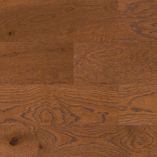 Close-up of a wooden surface with a rich brown color and visible grain pattern.