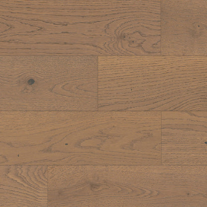 Close-up of wooden flooring with a herringbone pattern
