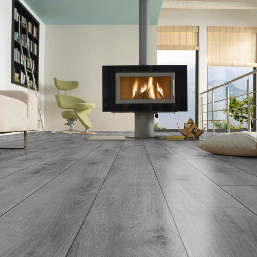 Modern living room with a fireplace and wooden flooring