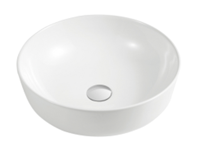 A round, white ceramic basin with a simple design, featuring a central drain hole and a subtle indentation on the front for a handle or faucet.