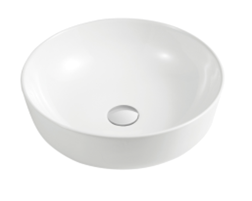 A round, white ceramic basin with a simple design, featuring a central drain hole and a subtle indentation on the front for a handle or faucet.