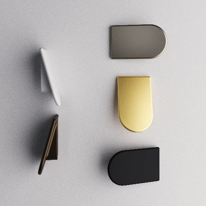 Set of five metallic money clips in different colors on a light gray background