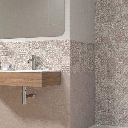 Bathroom with a sink, mirror, and decorative tiles on the wall.