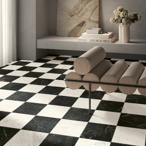 Modern interior with a checkered black and white floor, a beige bench, and decorative elements.
