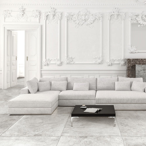 Antica white marble effect porcelain tile in living room setting